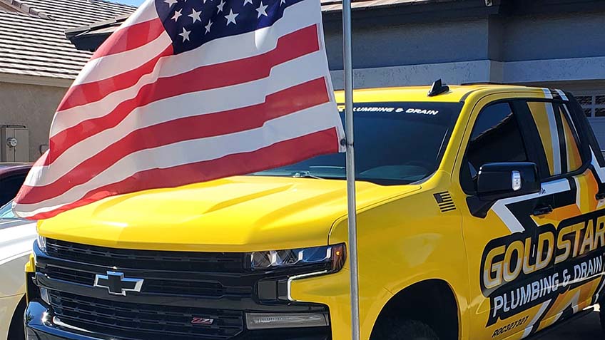 Plumbing Company Truck with the United States Flag