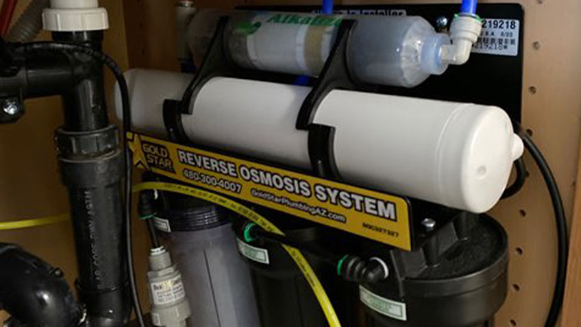 Reverse Osmosis System Installed in Kitchen Cabinet Under the Sink