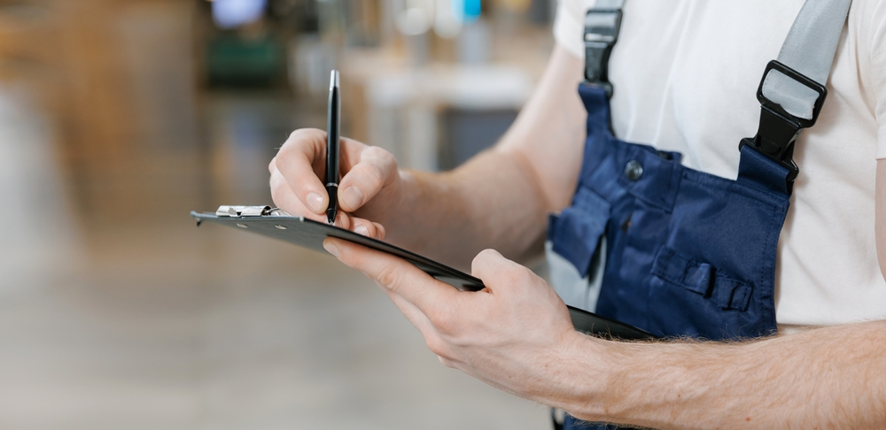 person looking at “plumbing checklist”