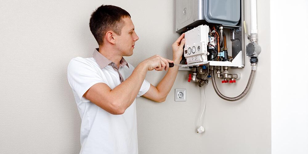 water heater being installed by homeowner